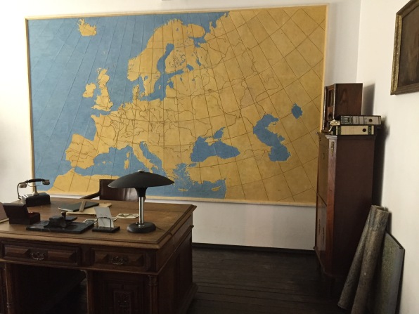 Oskar Schindler's desk with a list of Jews he saved, and a wall map in his office.