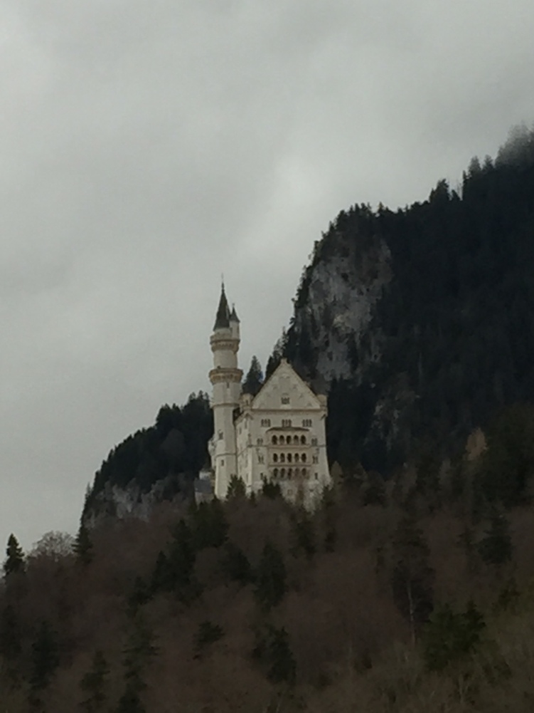 First sighting of Neuschwanstein Castle - way up on the hill